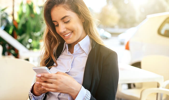 Woman applying to a job from her mobile phone