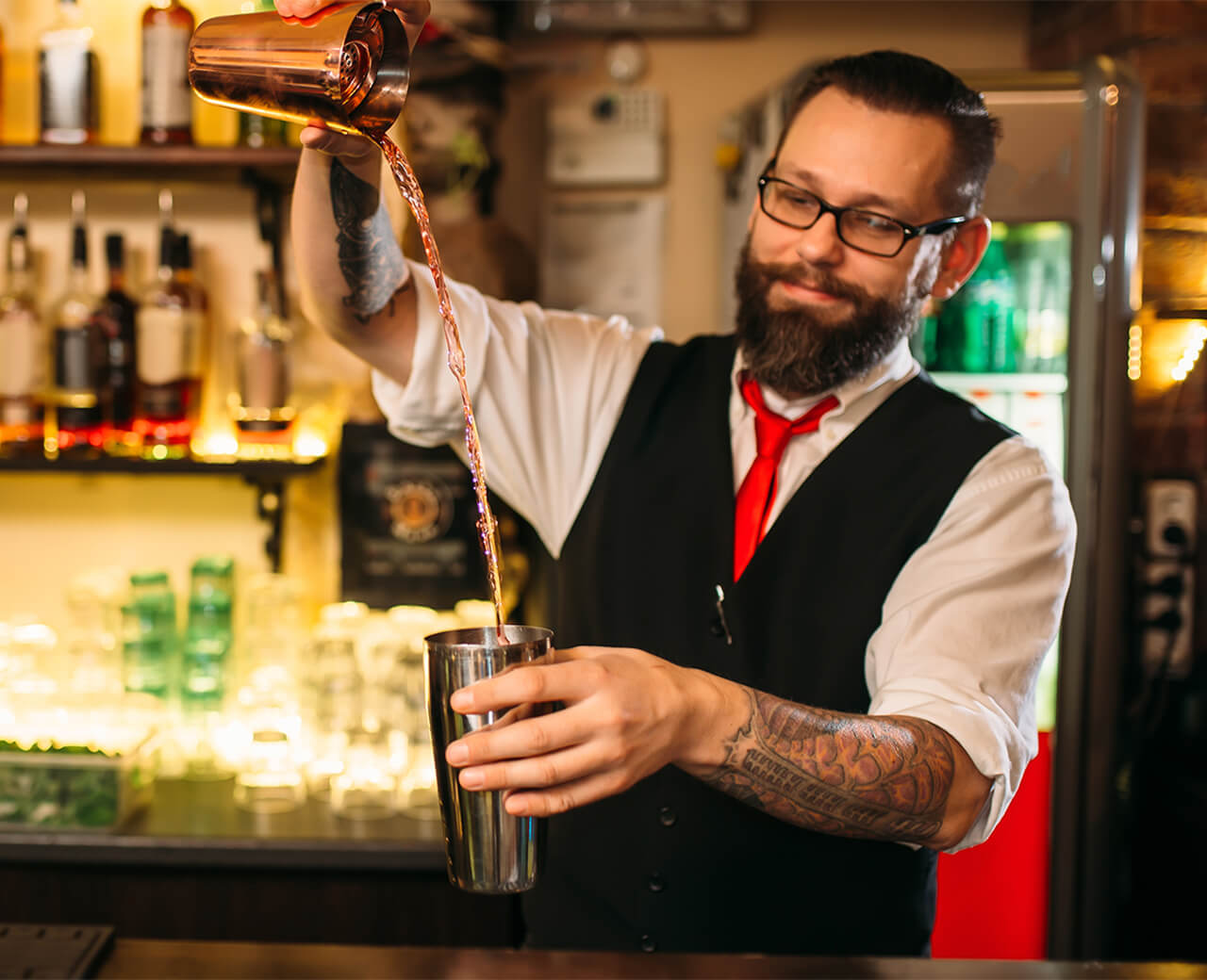 A bartender mixing drinks at a Hard Rock Hotel & Casino