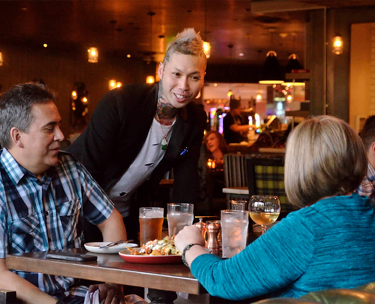 3 people dining at a Hard Rock hotel & Casino
