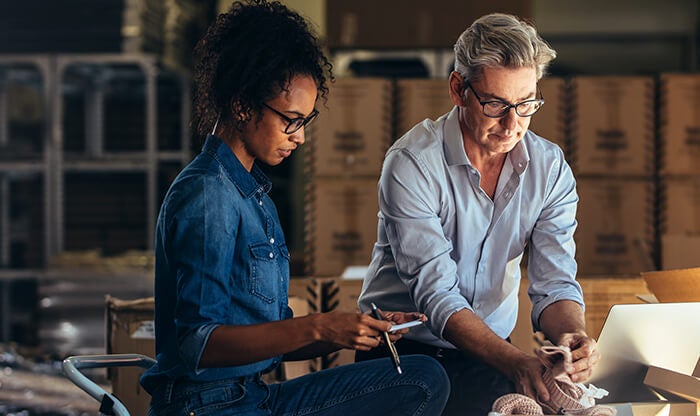 Two employees collaborating at small business