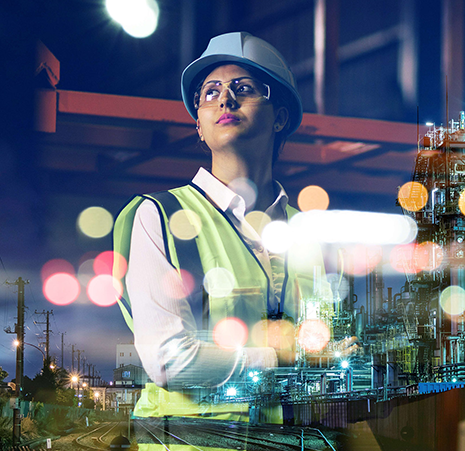 Chemist with a building in the background