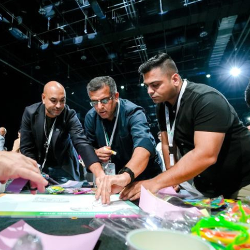 G42 team collaborates around a table