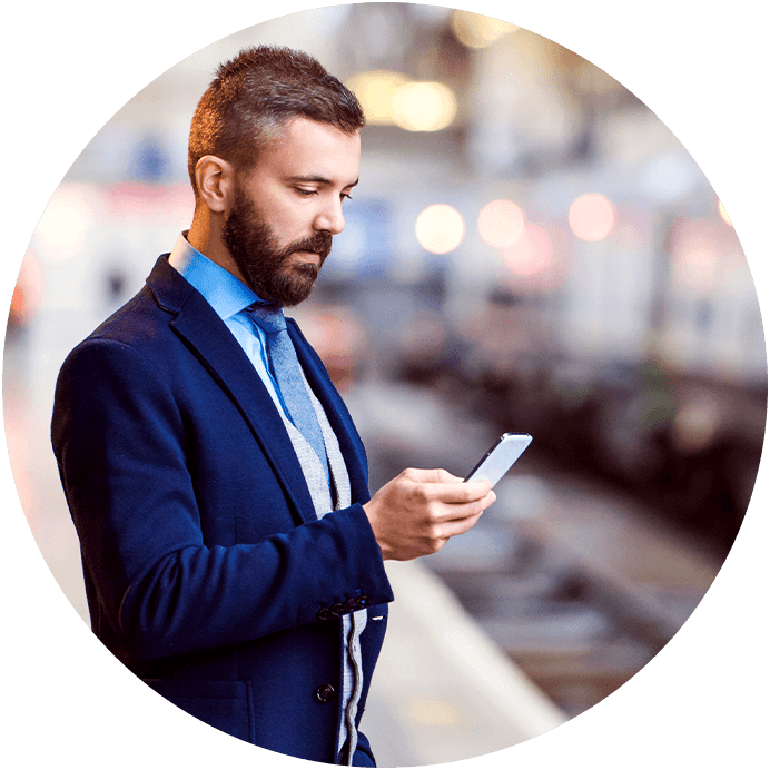 Microsoft general manager and iCIMS partner looking at his mobile phone
