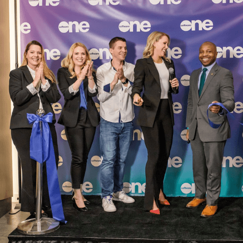 SoftwareONE employees cut the ribbon at their North American HQ